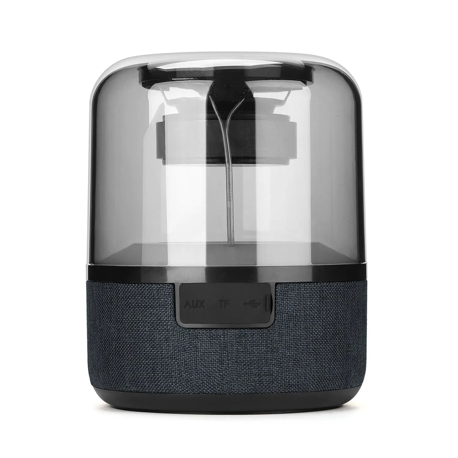 Four-colour light touch wireless Bluetooth speaker with halo lighting effect on a table.