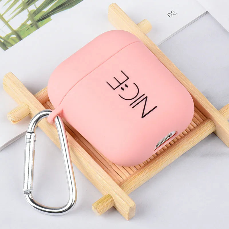 Black and pink hard PC protective cases for AirPods with decorative flower, love, and smiley face designs