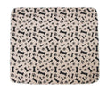 Three-layer waterproof pet absorbent pad for dogs and cats in aprico colour on a wooden floor