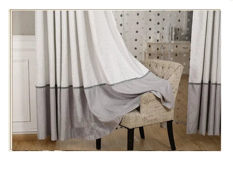 Single blackout curtain panel showing choice of hook and ring header styles on a rail.