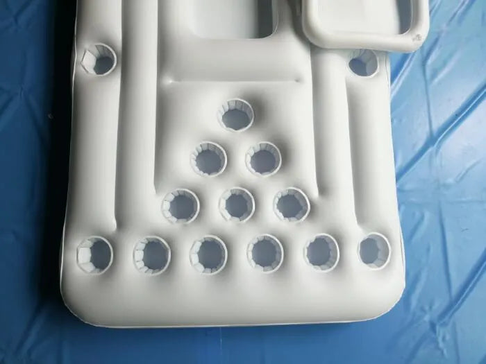 White inflatable beer pong table pool float with cup holders and built-in cooler on water surface
