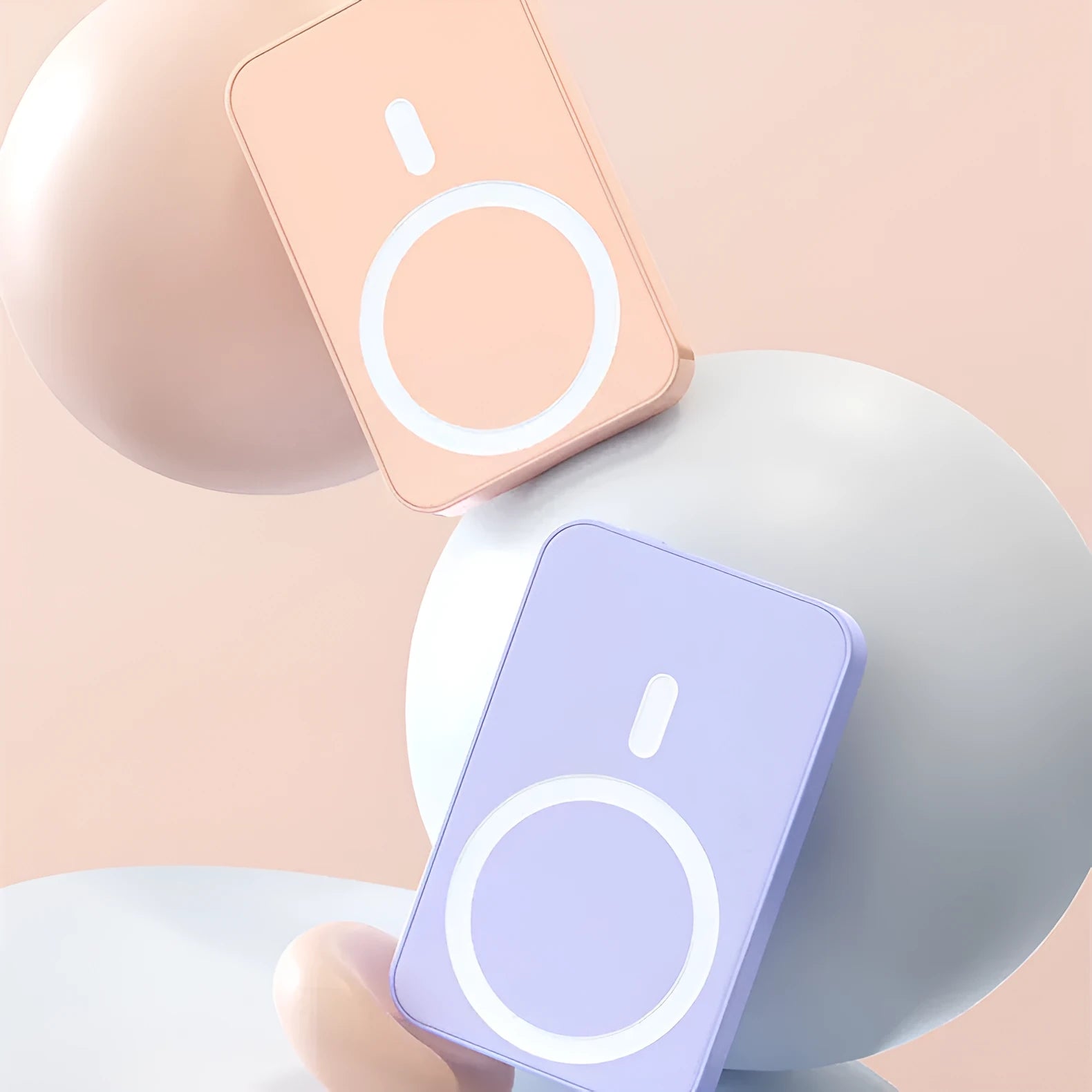 Pink wireless magnetic power bank showing dimensions and magnetic charging connector.