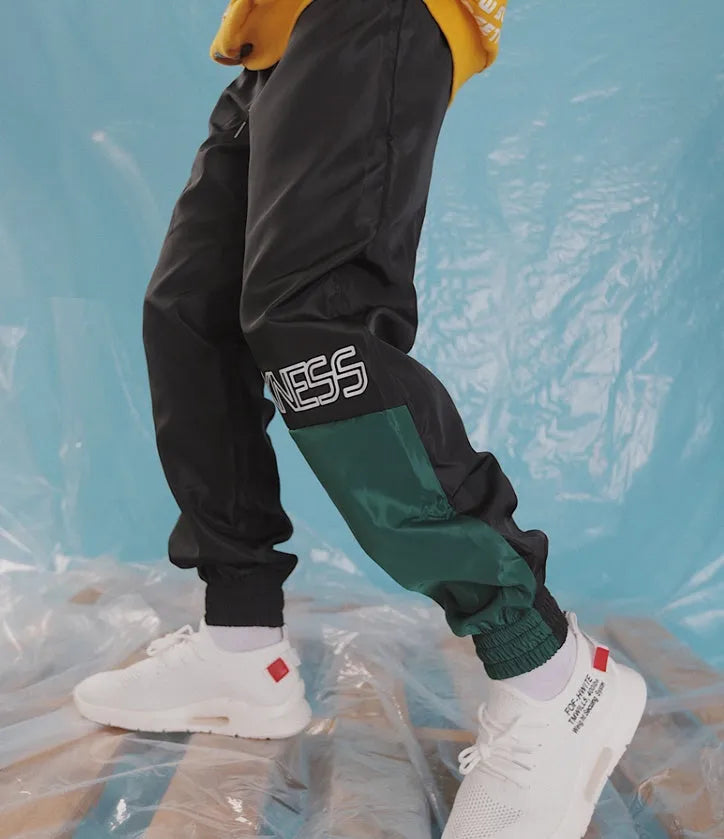 Japanese hip hop trousers with colour stitching, printed letters and bouquet foot in green or white