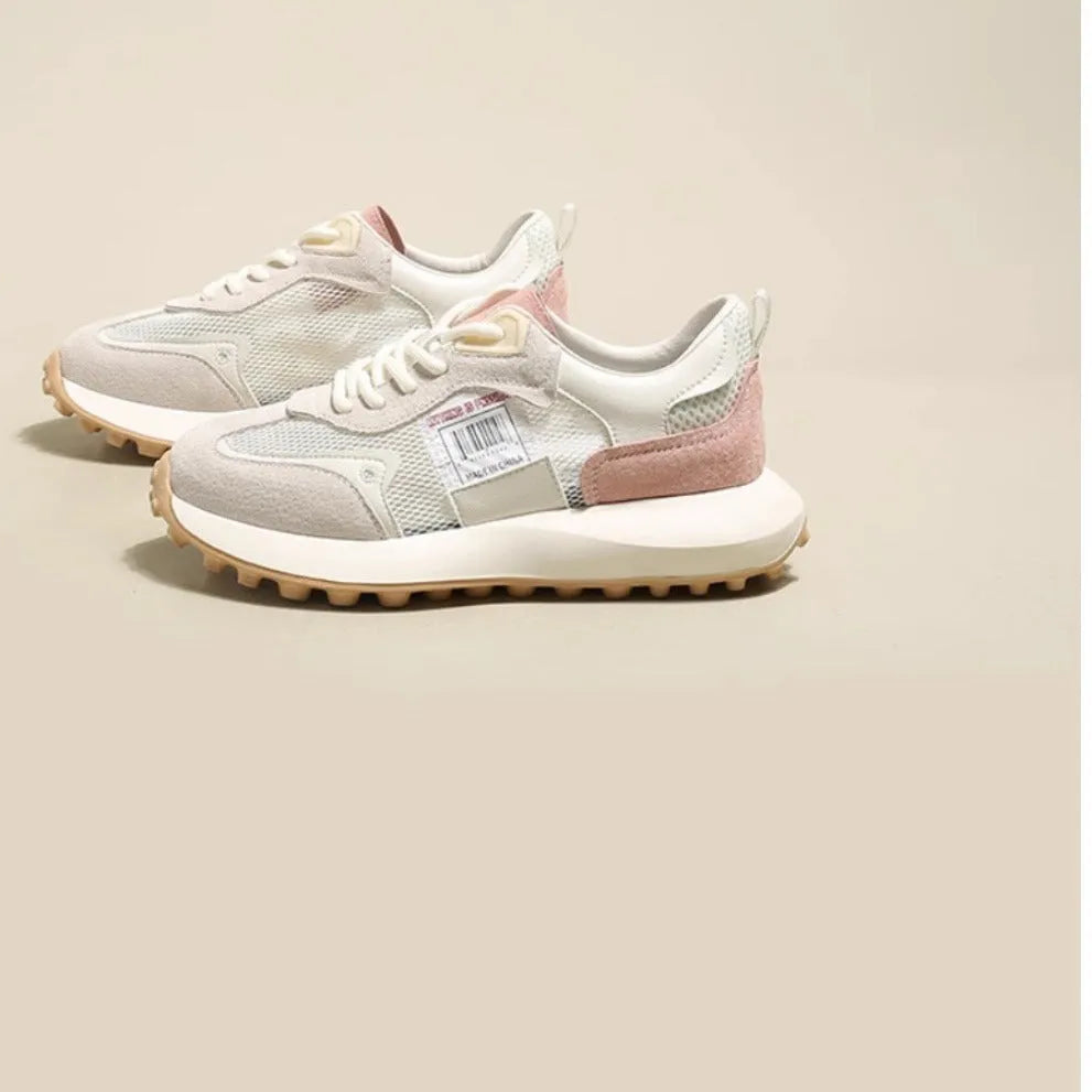Women's grey and pink low-top retro sneakers with mesh lining and rubber sole
