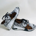 Women's lightweight casual sneakers with suede upper and wedge heel in multiple colours.