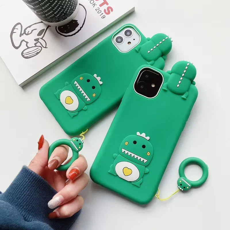Green silicone phone case with a cartoon animal design for Apple iPhone models.