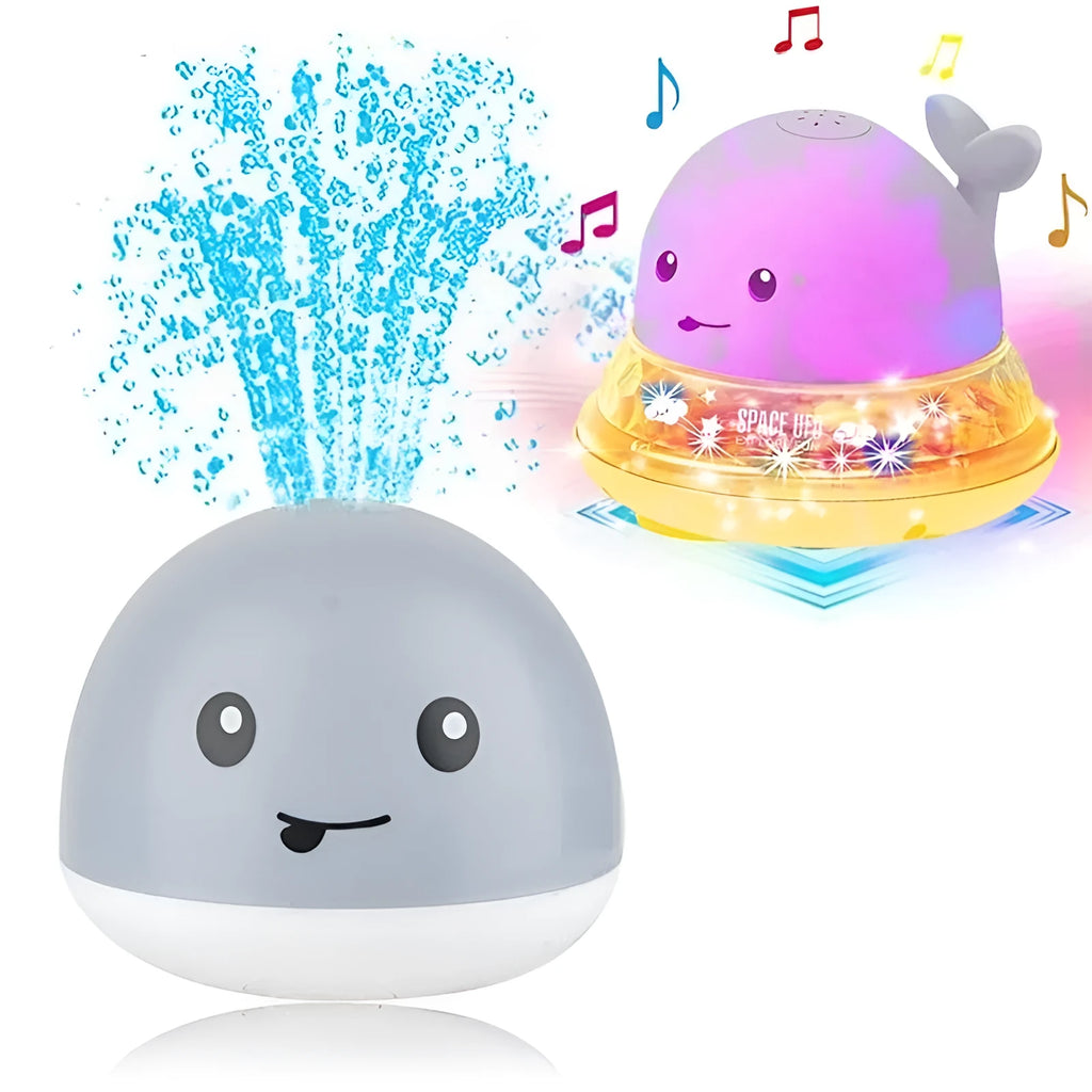 White and blue whale bath toy spraying water with LED lights illuminated