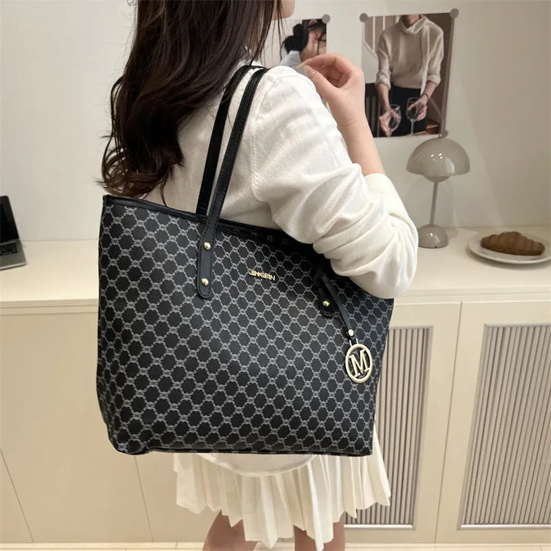 Black PU street style shoulder bag with visible stitching, shown next to grey, white, and brown colour options.