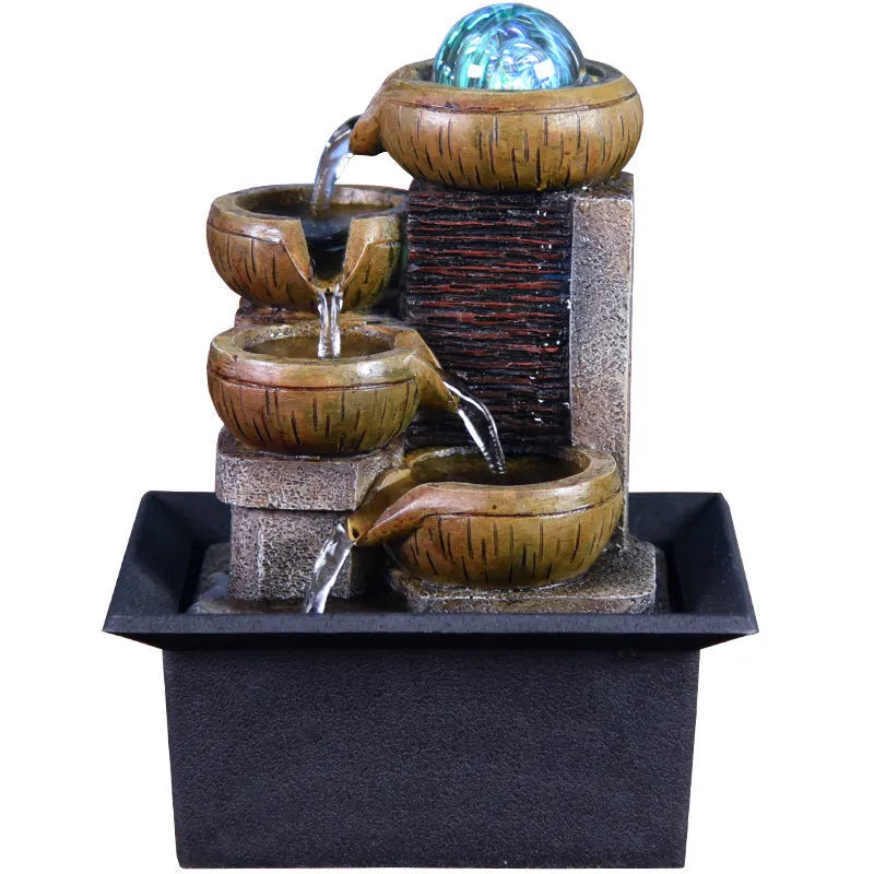 European desktop fountain with running water crystal ball intricate carved rustic design on wooden table
