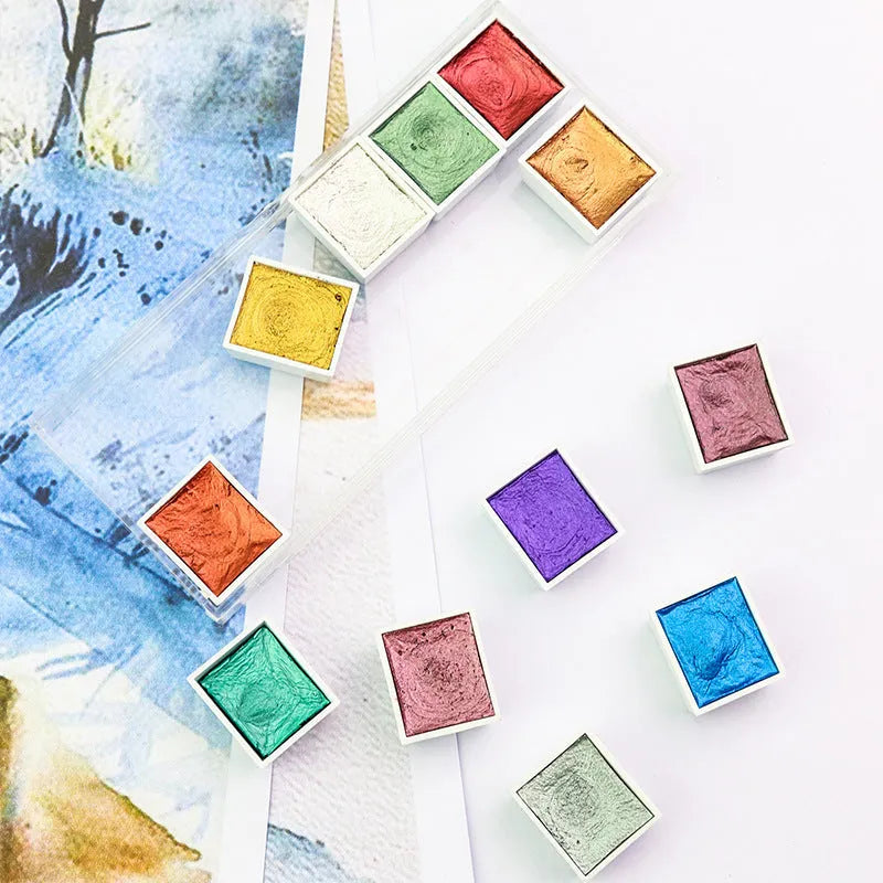 Boxed set of solid pearlescent watercolour pigment blocks in various colours for painting and nail art.