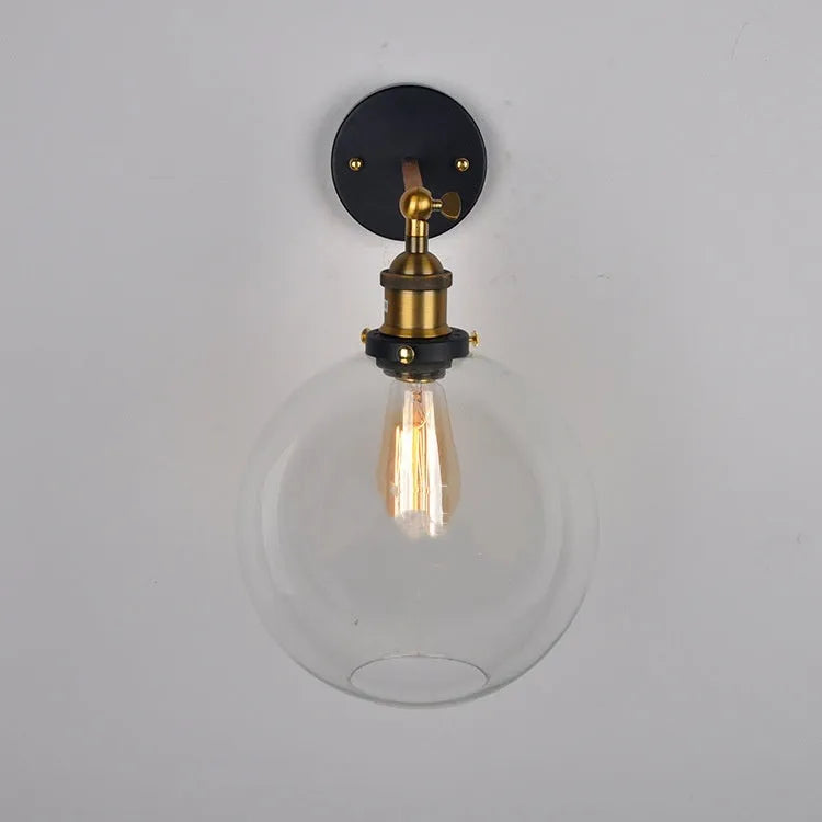 20cm round retro glass ball wall lamp in amber, smoke grey, or transparent finish with aluminium holder.