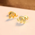 Geometric silver stud earrings with gem setting, shown in gold and silvery colour options.