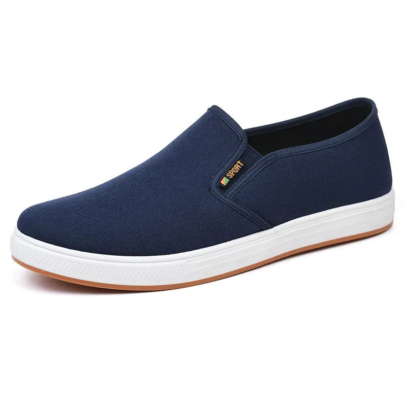 Men's black and blue slip-on canvas trainers with round toe and shallow mouth design