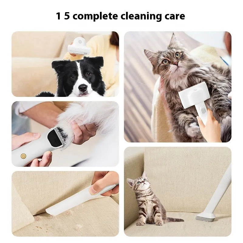 Pink and white pet hair vacuum cleaner with grooming clippers, hose, and attachments on white background