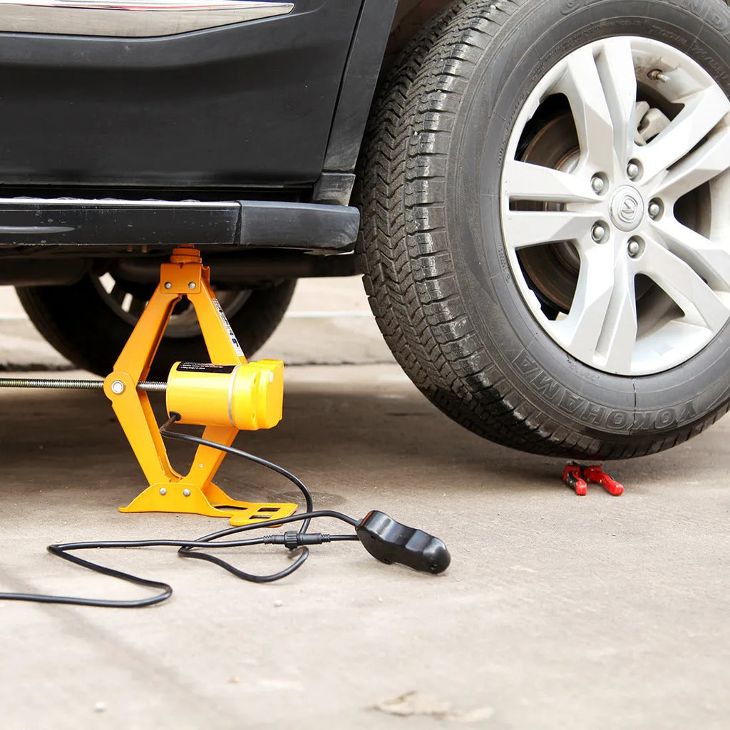 TY002 style hydraulic electric car jack with lifting pad extended.