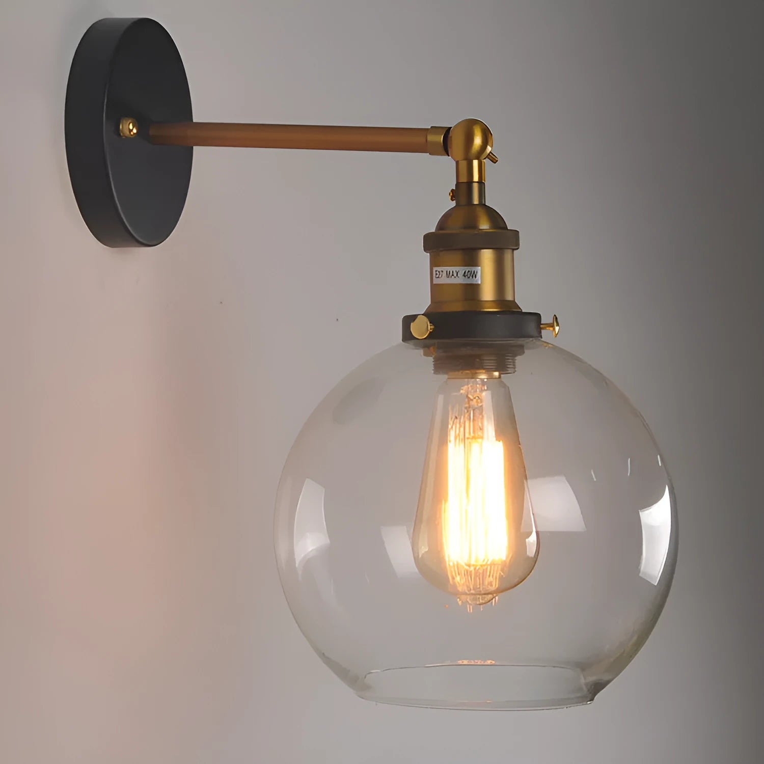 20cm round retro glass ball wall lamp in amber, smoke grey, or transparent finish with aluminium holder.