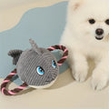 Grey, green, and orange turtle-shaped plush dog toy with knot details and squeaker.