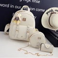 Women's three-piece PU leather bag set showing backpack, shoulder bag, and card holder with floral details