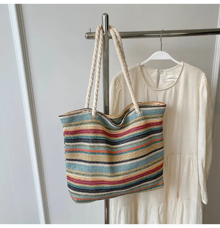 Blue straw woven nylon shoulder bag with polyester lining and single shoulder strap