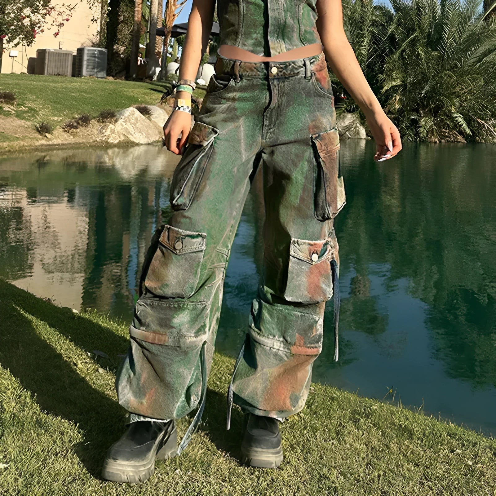 Retro colour blooming loose cargo denim trousers with multiple gradient patch pockets on a model.