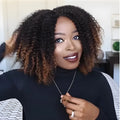 Short curly wig made of high temperature silk with long bang in black gradient brown colour on a wig stand