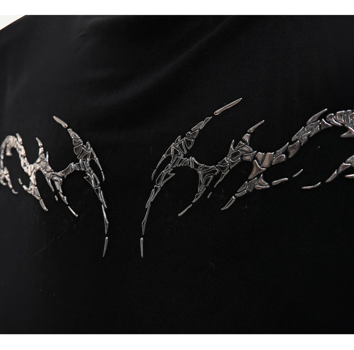 Men's black mesh bottoming shirt with slim fit design and long sleeves showing cooling fabric construction