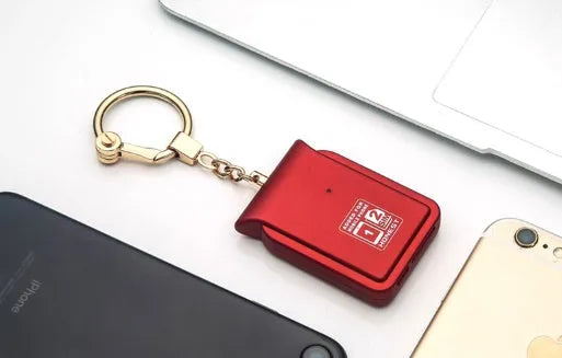 Bluetooth dual SIM adapter keychain for iOS in various colours with Nano SIM slot and Micro USB port