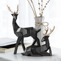 Resin deer sculpture decoration in a simple modern animal style for home table, shelf, or mantel display.