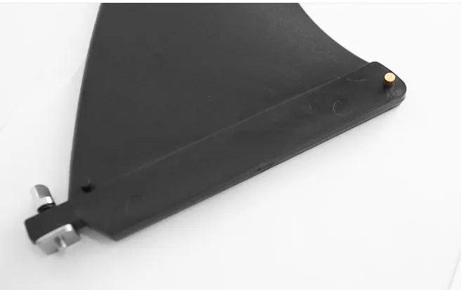 SUP paddle with large removable fish fins showing screw mounting system