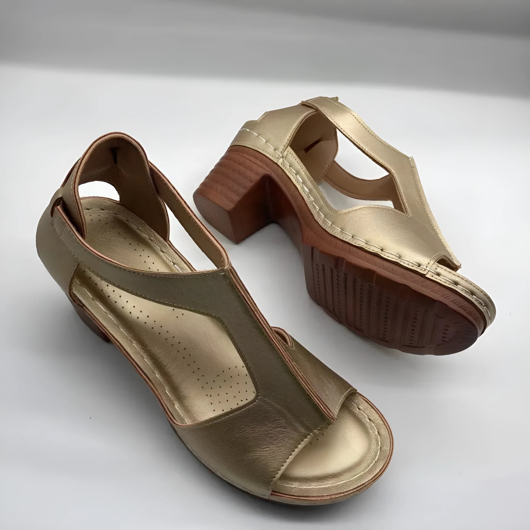 Peep toe wedge sandals with Roman style buckle and fish mouth open toe design in creamy-white colour