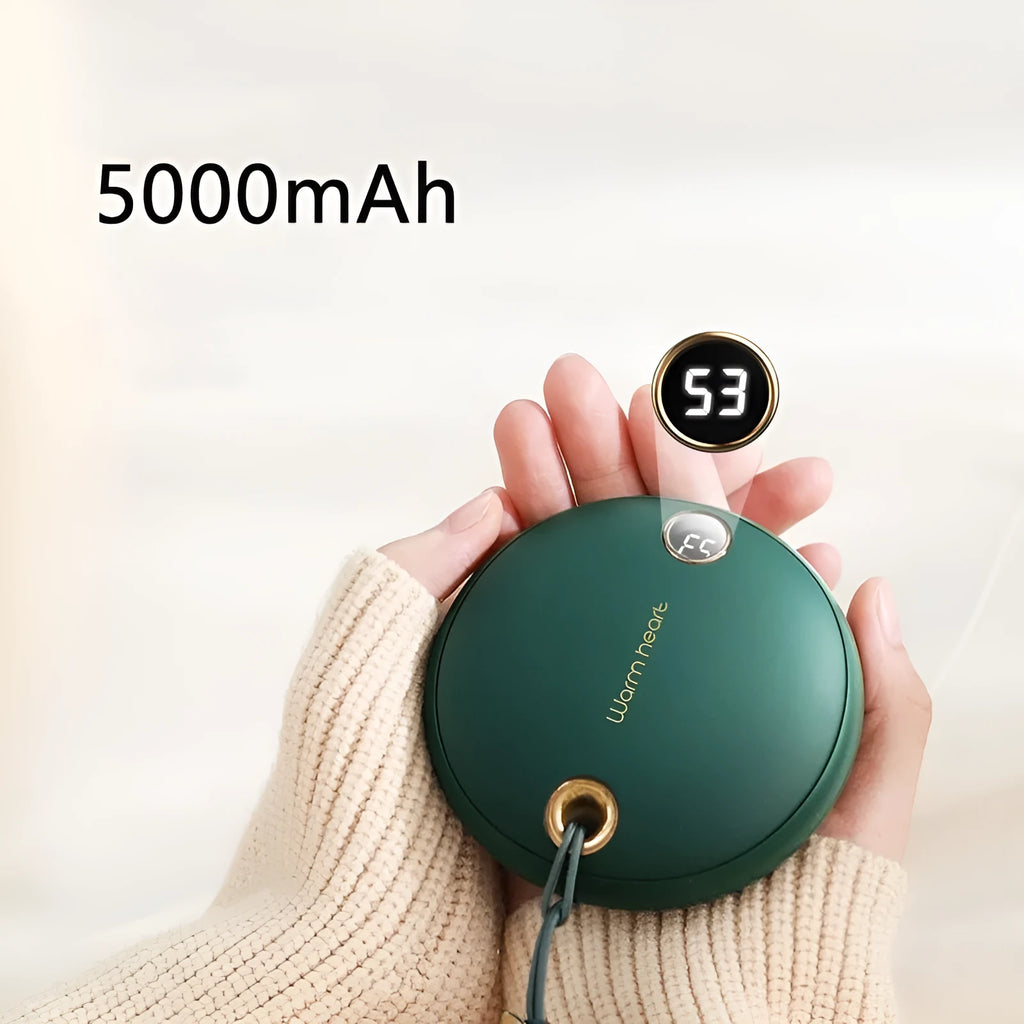 Green Pink or White coloured 5000mAh hand warmer power bank with digital display showing charge level.