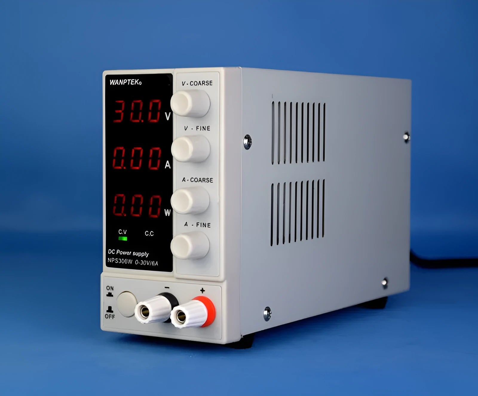 White NPS605W adjustable DC laboratory power supply with voltage and current controls for electronics repair.