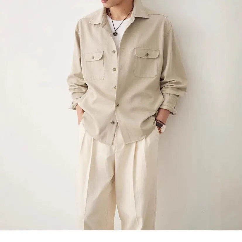 Men's light sand rice coloured lapel shirt with long sleeves on a hanger