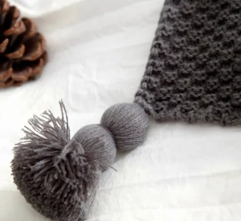 Nordic fringe knit ball acrylic blanket measuring 130×170cm in beige colour
