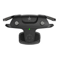 Black F5 Bluetooth mobile game controller with phone clamp next to smartphone