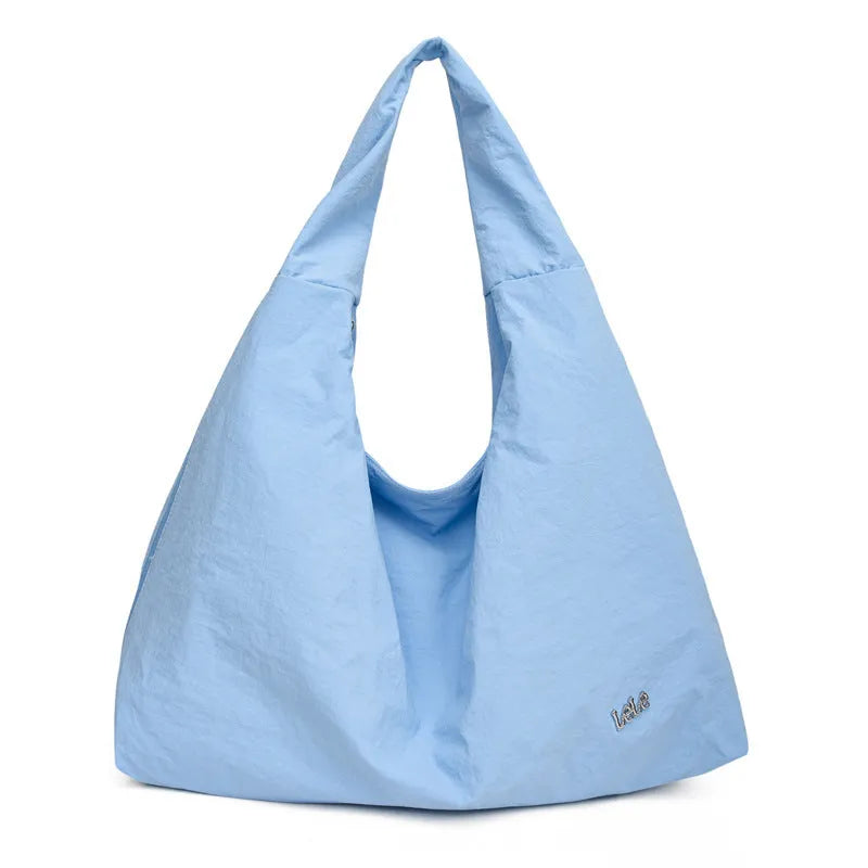 Heart-shaped nylon underarm bag for women in black, blue, khaki, and yellow colour options