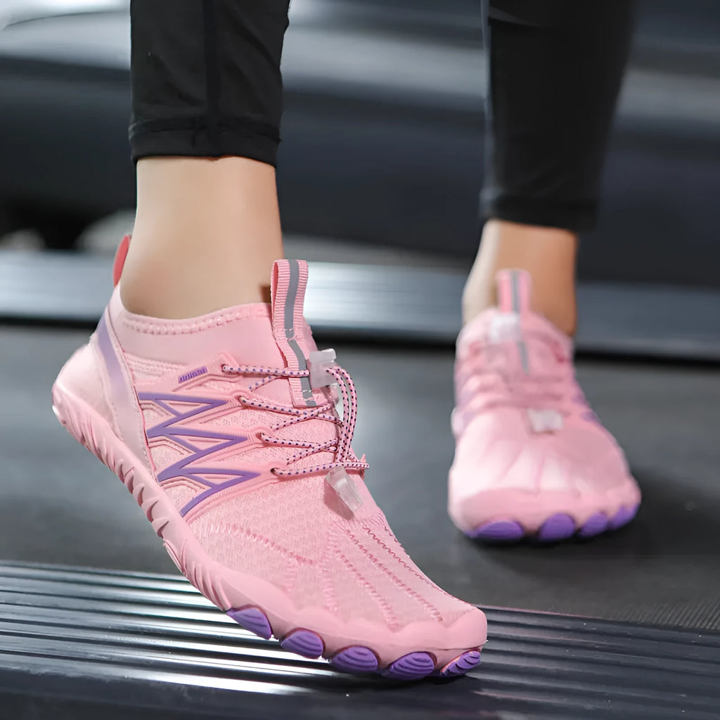 Indoor fitness training sneakers with non-slip rubber sole in various colours showing striped pattern and low top design