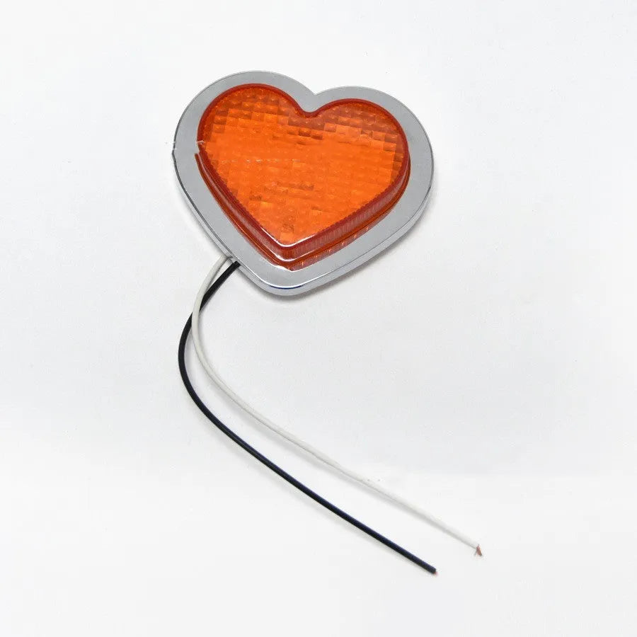 Heart-shaped LED vehicle sidelight in red colour showing Japanese-style design