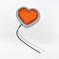 Heart-shaped LED vehicle sidelight in red colour showing Japanese-style design