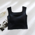 Women's non-marking seamless nylon sling vest with chest pad in light blue, shown from the back.