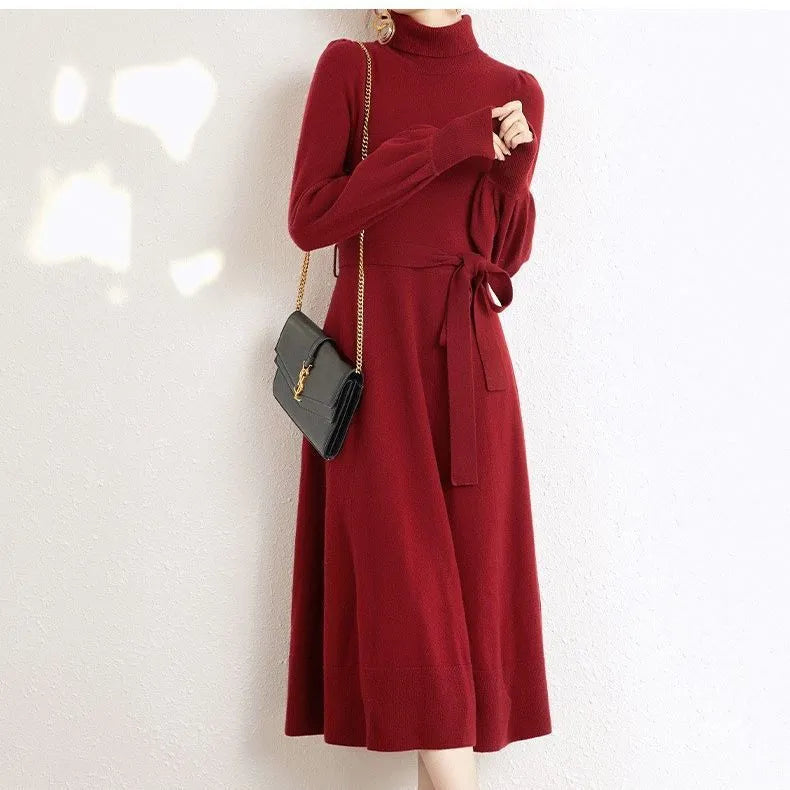 Turtleneck knitted dress with long sleeves, elastic waist, and loose hem in rose red, black, red, or blue colours
