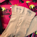Beige and black stovepipe socks for hip and abdomen lifting, made from polyester fibre.