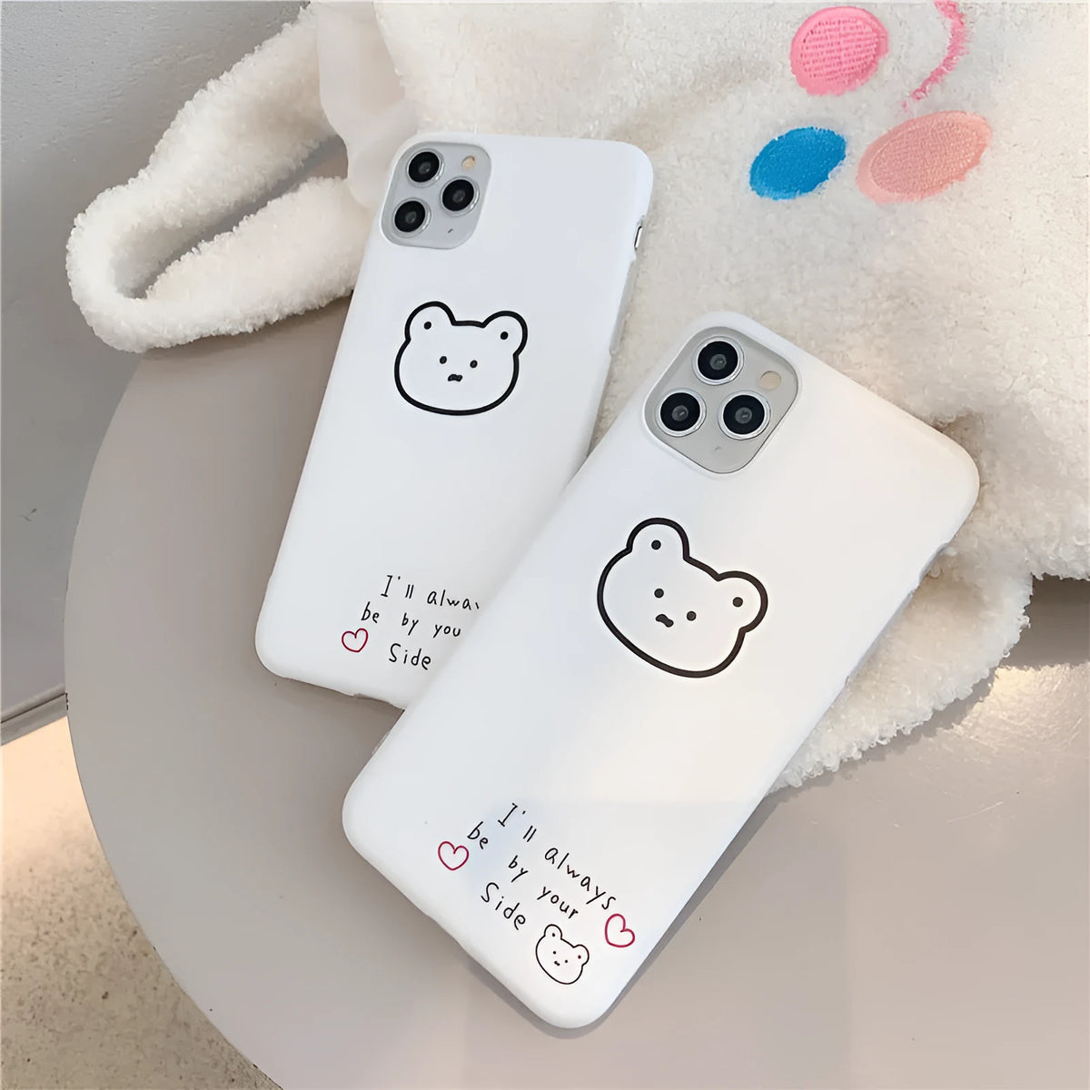 Soft silicone iPhone case with a printed Korean bear cartoon design on the back.