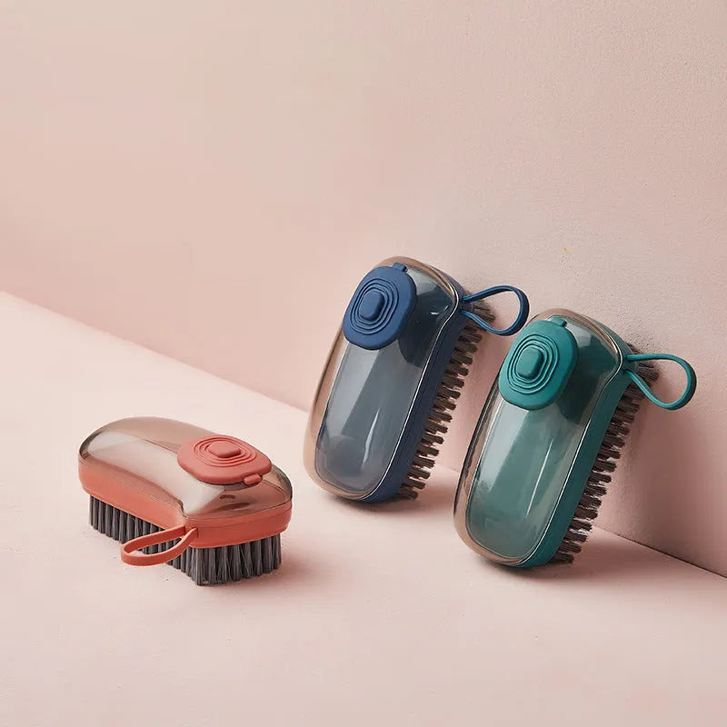 Automatic liquid cleaning brush with ergonomic grip in blue, green or red colours for shoes and laundry