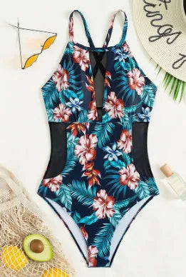 Women's deep V neck one-piece swimsuit in a printed pattern with polyester lining.