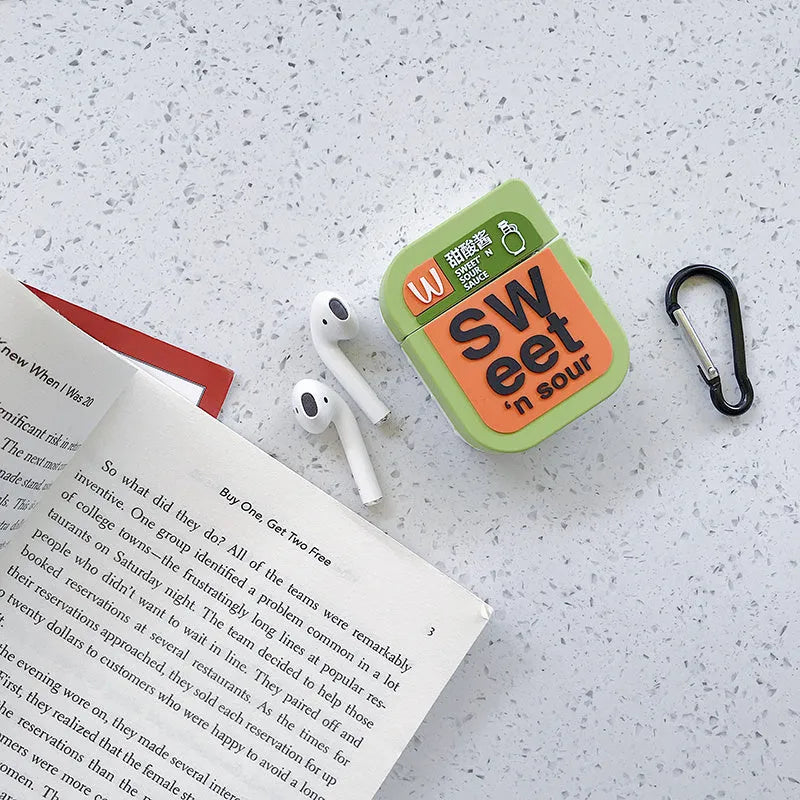 Green silicone protective case for AirPods 1 and 2 with a cartoon animal design on the front.
