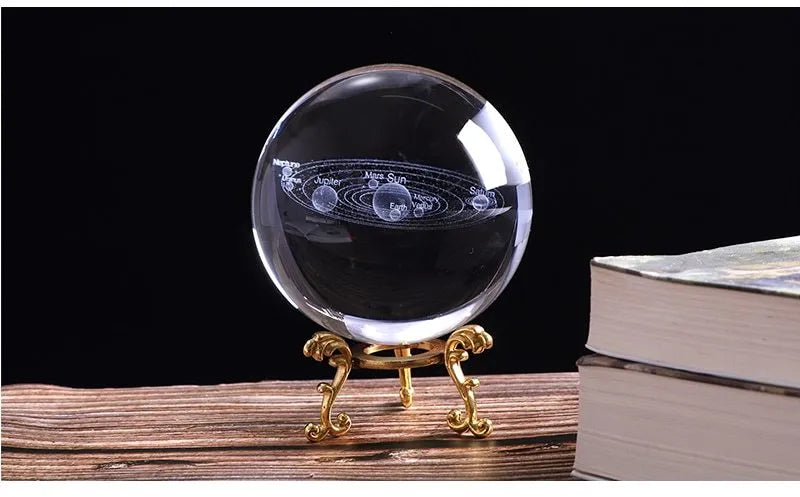 Solar system 3D engraving inside clear K9 crystal ball on a wooden stand