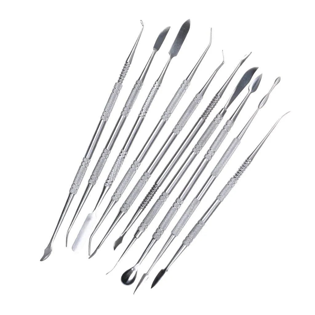 Ten stainless steel clay knives with photo colour handles arranged on a surface for pottery sculpting work.