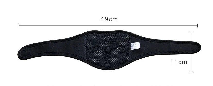 Black self-heating magnetic therapy neck guard with adjustable strap laid flat.