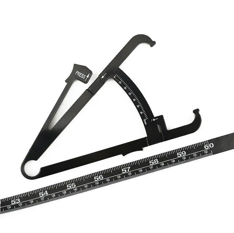 Black ABS plastic body fat caliper skinfold tester with measuring tape on a grey background.